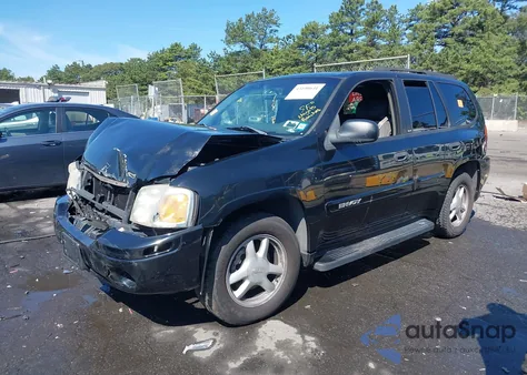 2003 GMC Envoy Sle z USA, uszkodzony, nr VIN 1GKDT13SX32343603